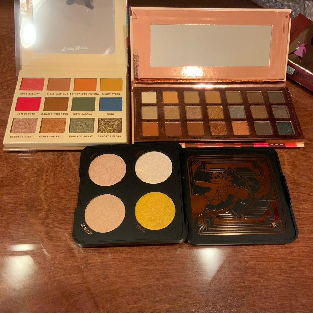 Three palettes, 2 are eye, 1 is highlighter
